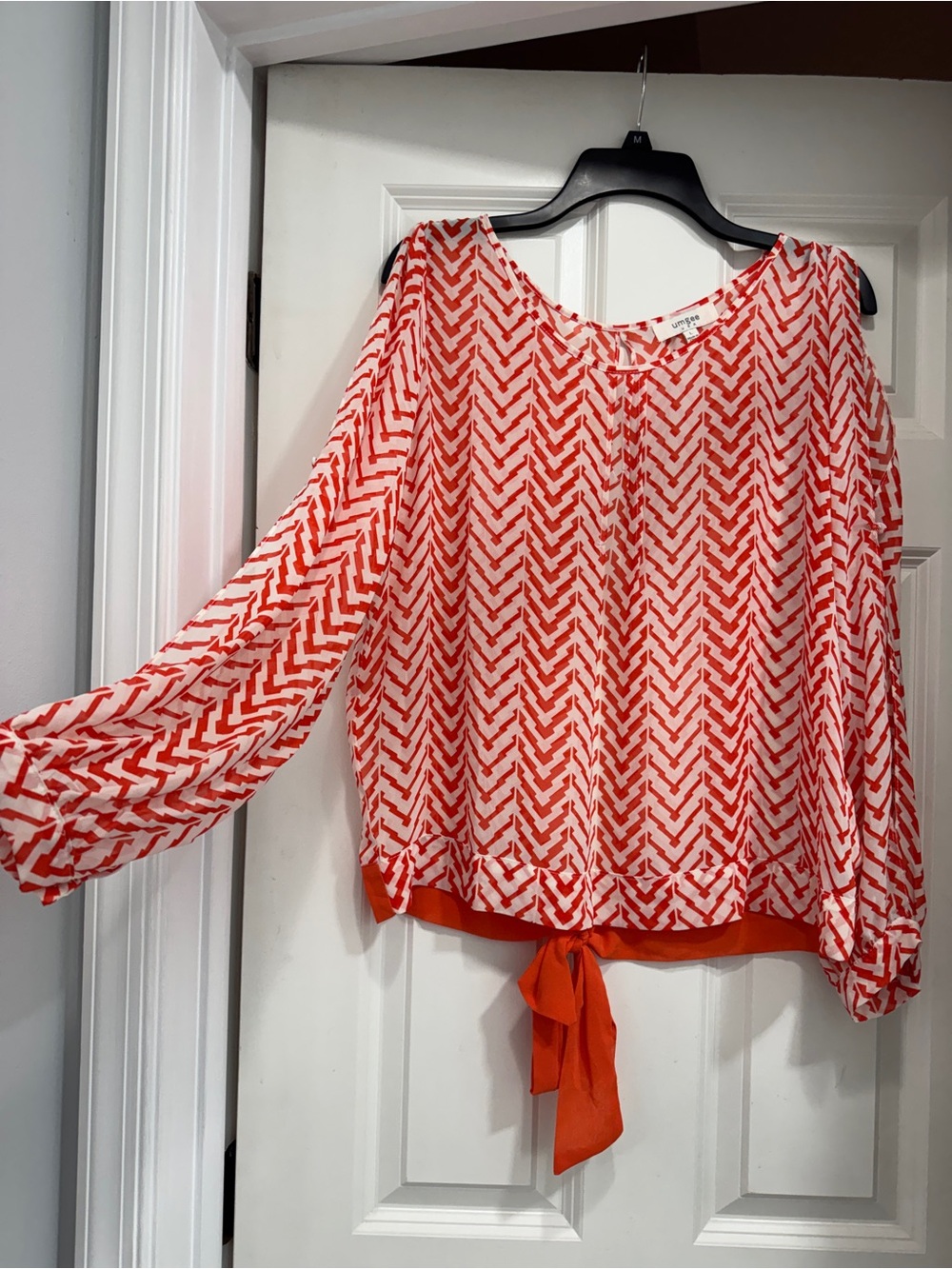 Umgee Orange and White Chevron Tie-Hem Blouse; sheer featherlight cold shoulder